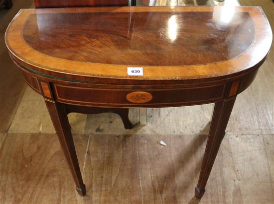 George III satinwood banded mahogany D shaped card table(-)